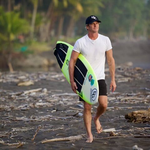 NSC Trucker Hat on surfer